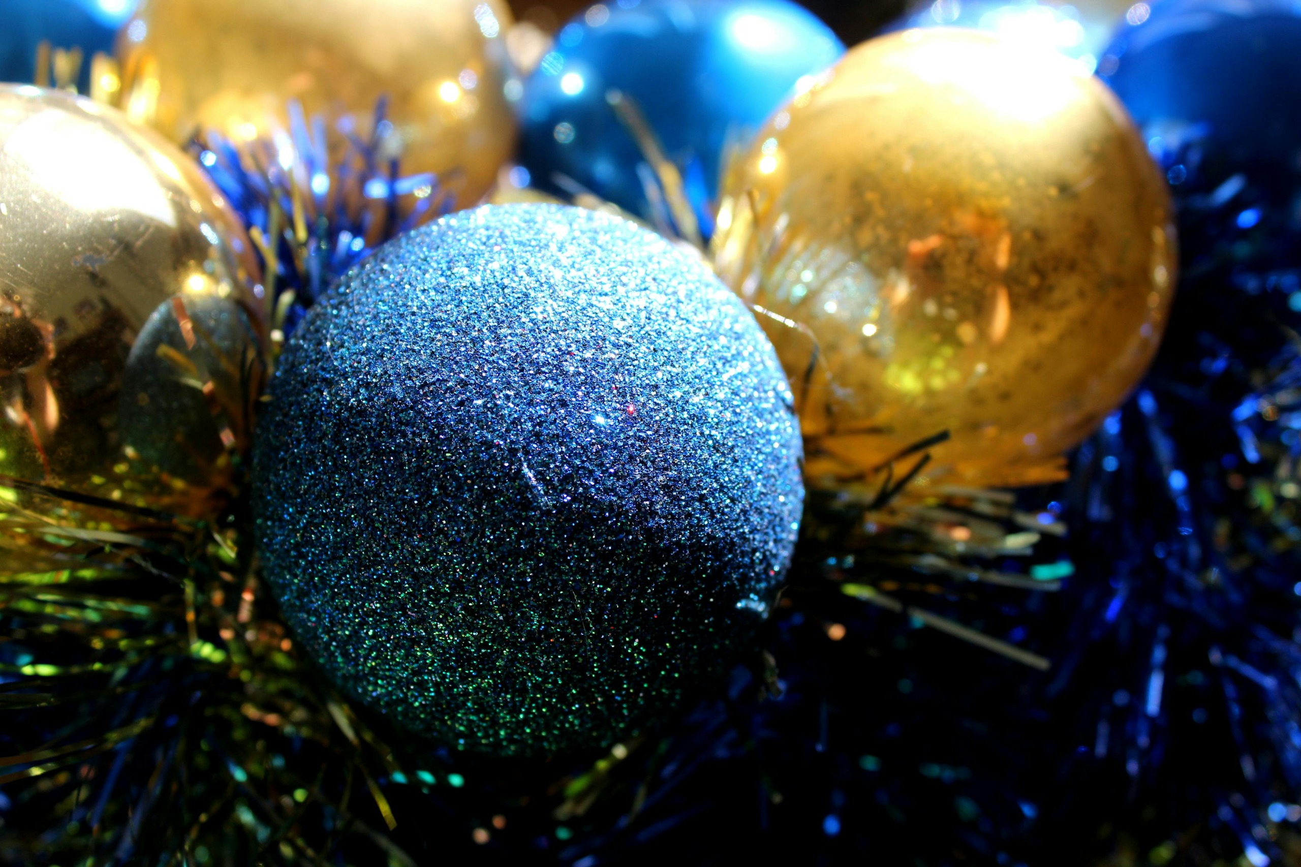 close up of blue and gold baubles